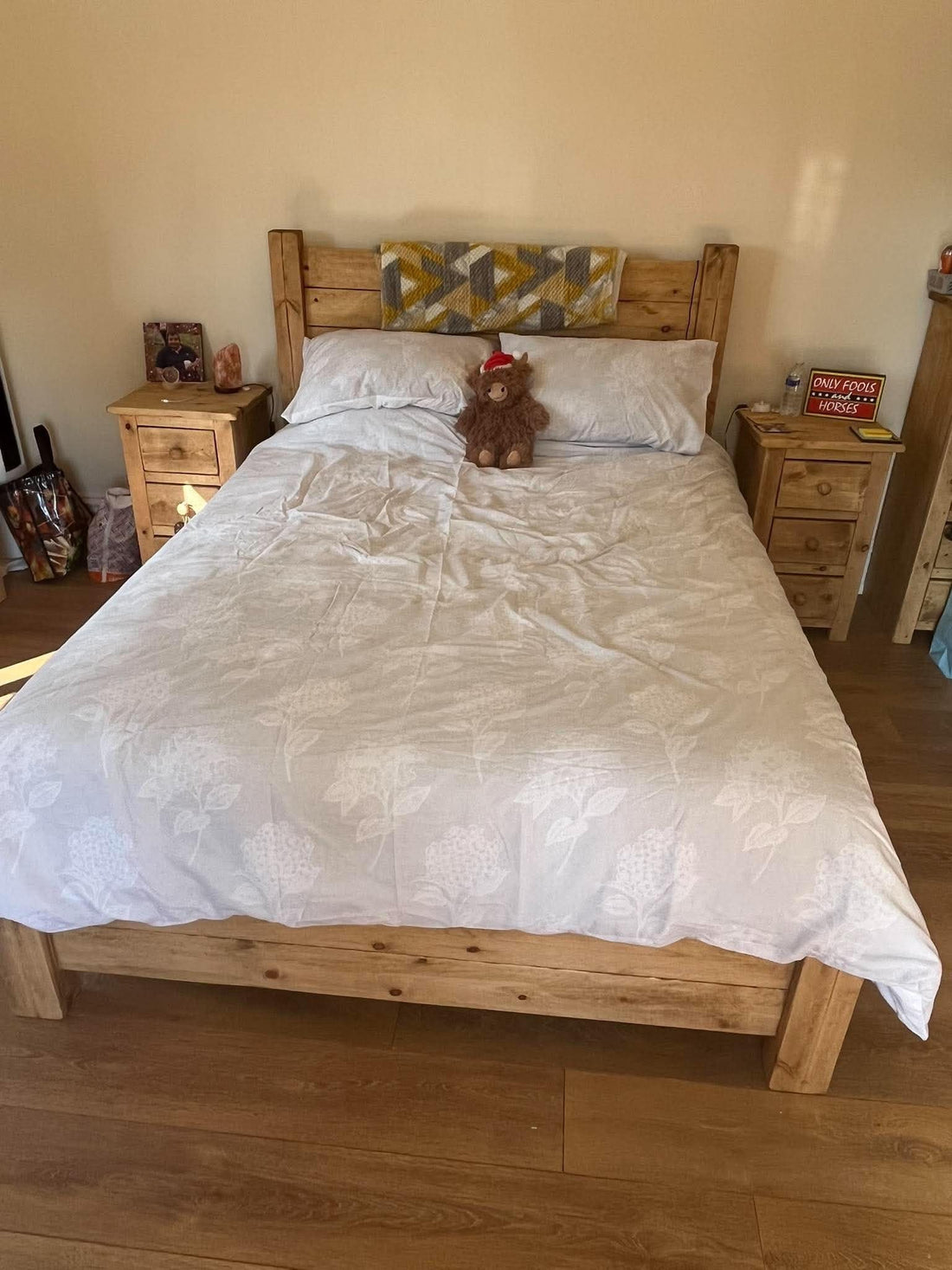 Kayley Fleming’s handmade kingsize wooden bed and matching bedside cabinets in her home