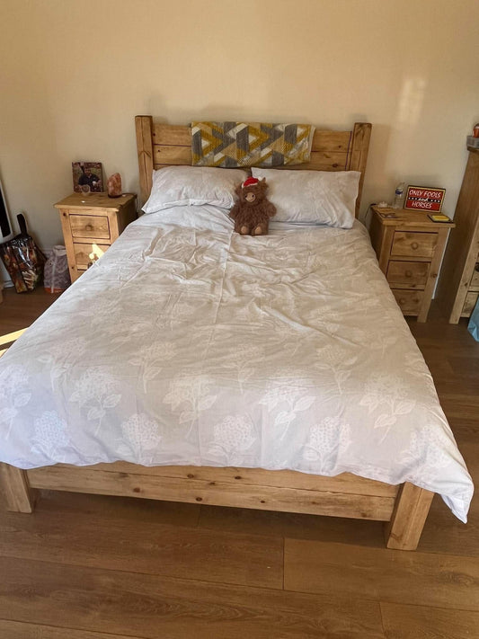Kayley Fleming’s handmade kingsize wooden bed and matching bedside cabinets in her home