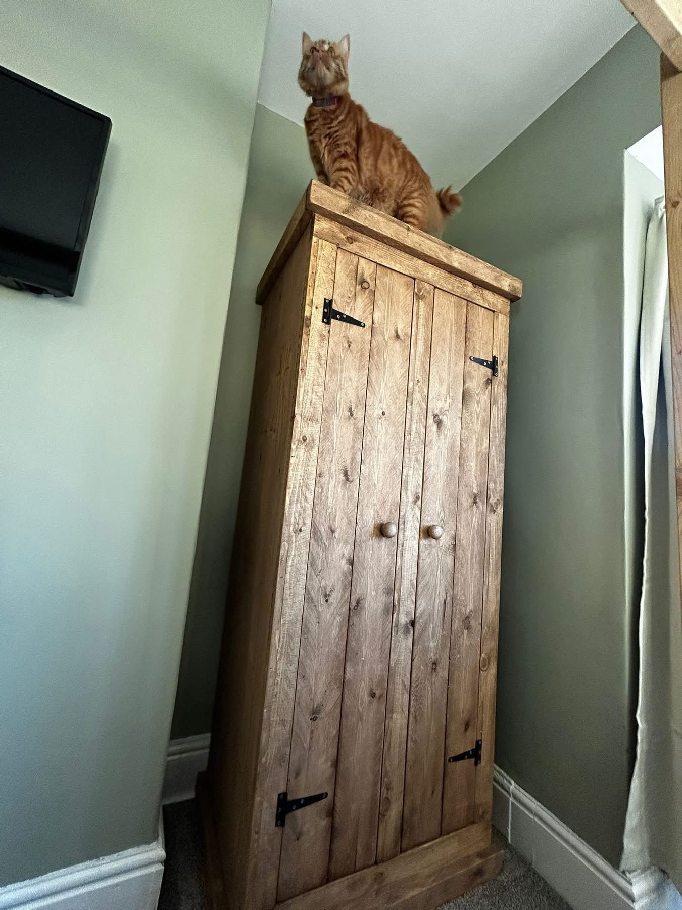 Handmade wooden wardrobe in rustic wax finish