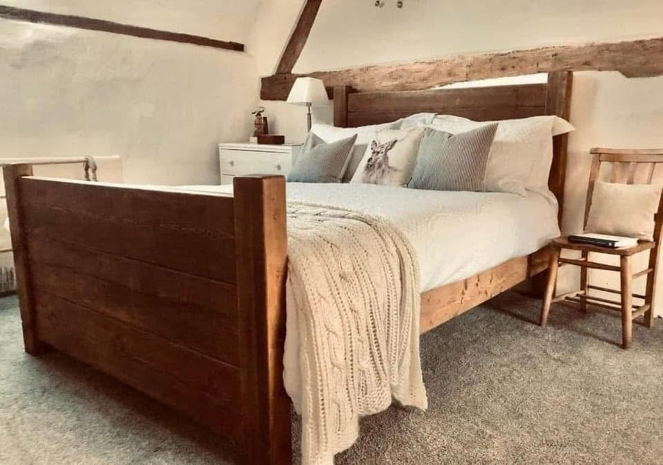 Solid timber High Plank wooden bed by Three Skulls Furniture