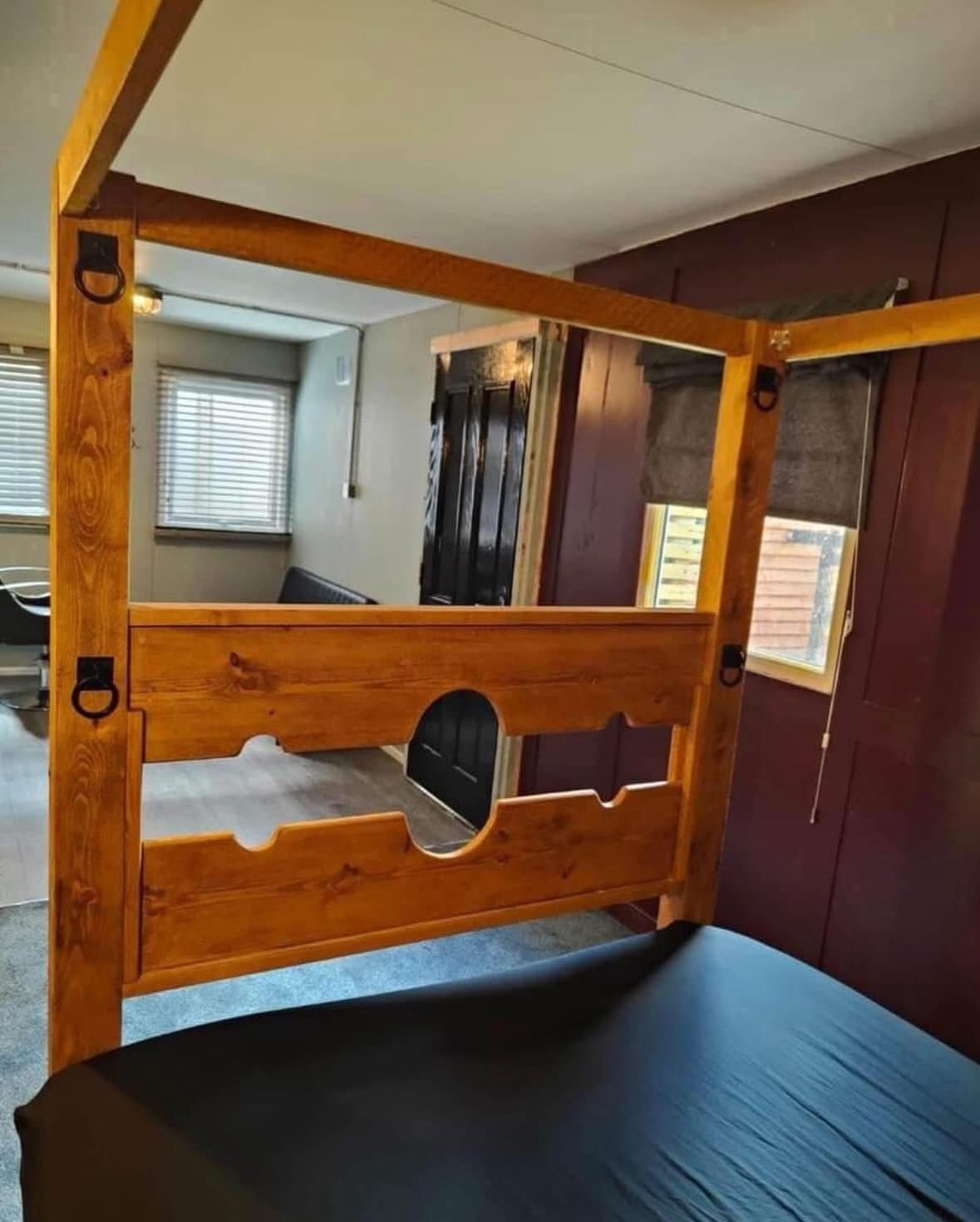 Tudor BDSM bed frame in rustic timber finish