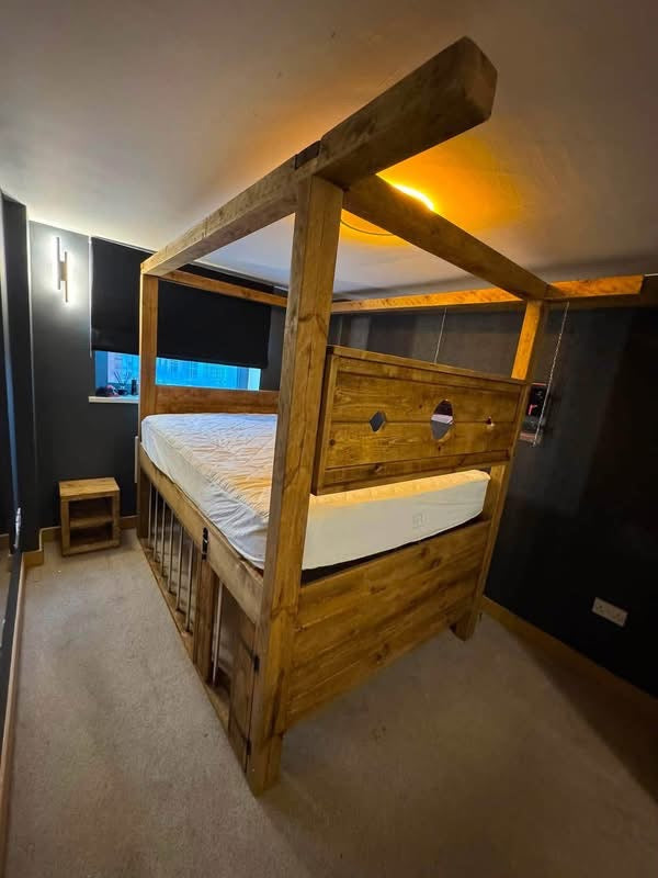 Handmade rustic wooden Dungeon Bed with four-poster frame