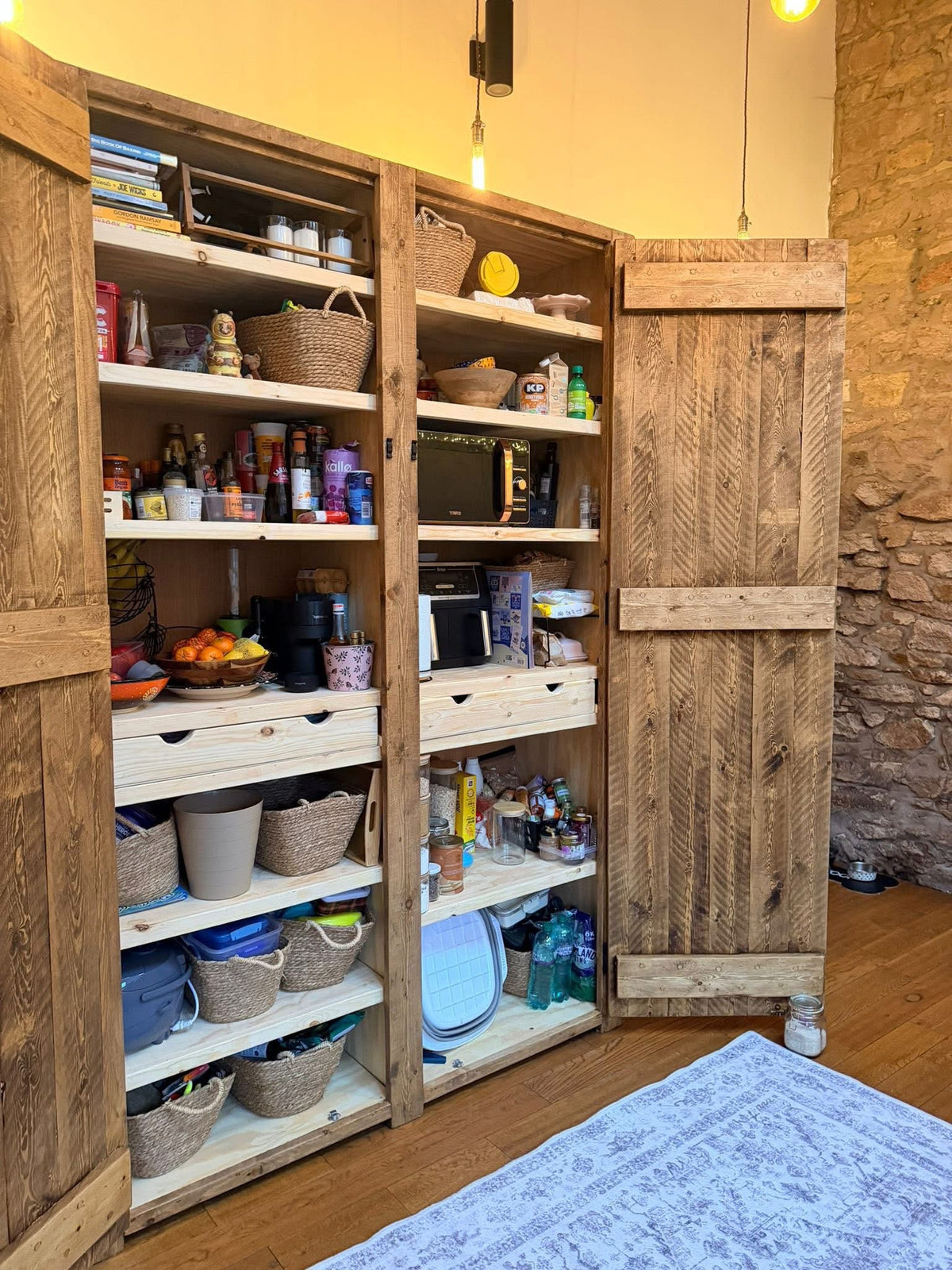 Finished bespoke larder fully stocked in the customer's home